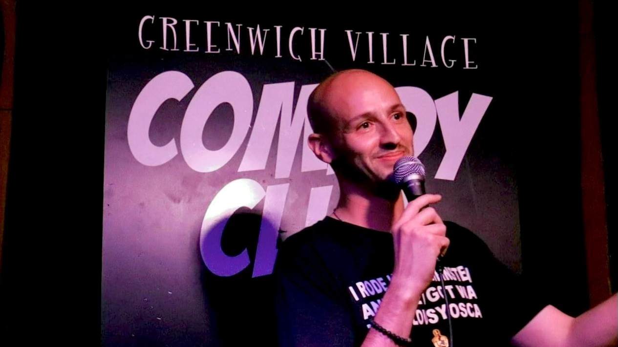 Dave Saitzyk doing stand up at Greenwich Village Comedy Club in NYC